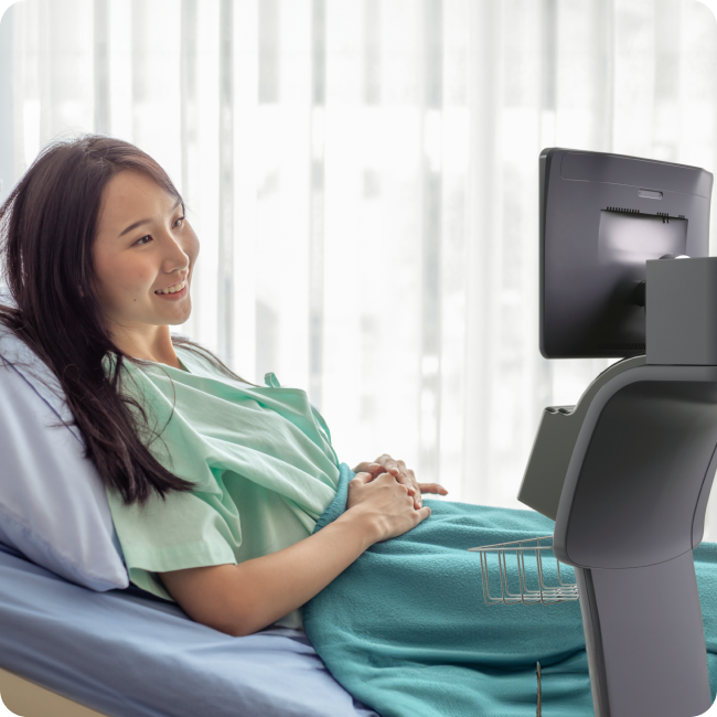 Dr. tēmi telepresence robot in a care setting
